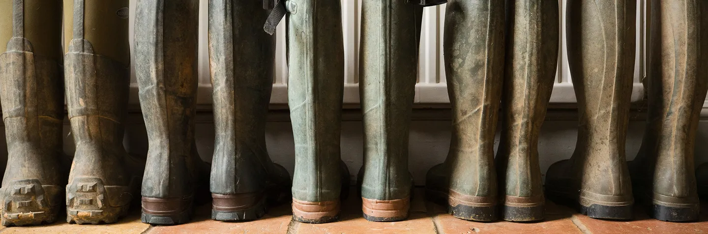 A row of farm wellies lined up at Taylors Farm Shop — a familiar sight for the generations of Lancashire families who visit